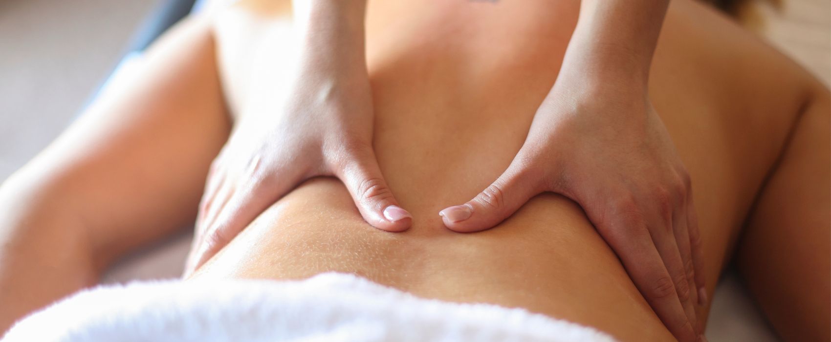 Suly, licensed massage professional at SUMASSAGE Miami